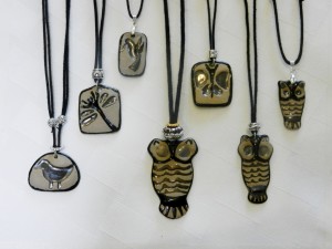 handmade stoneware clay owls, dragonfly, hummingbird, butterfly, dove pendants, adjustable cotton cord necklaces, elena calderon handmade jewelry