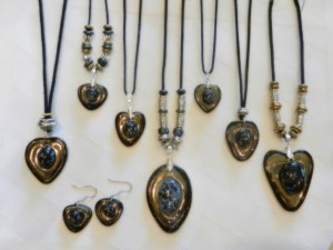 stoneware clay,snowflake obsidian cabacon gemstone, heart pendants, adjustable cotton cord, elena calderon handmade jewelry, beaded necklaces