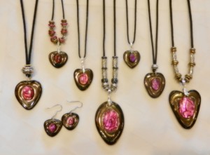 stoneware clay, heart pendants, pink paul shell cabachons, adjustable cotton cord, elena calderon handade jewelry, beaded necklaces