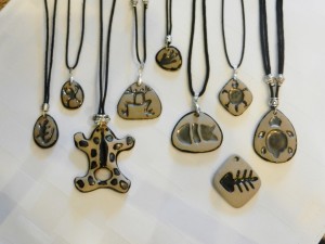 stoneware clay pendants, frogs, fish,turtles, kecko, adjustable cotton cord necklaces, elena calderon handpainted jewelry